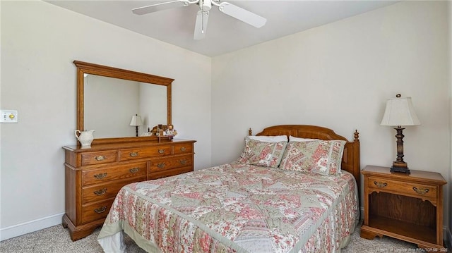 202 Juniper Creek Blvd, Pinehurst, NC 28374 - bedroom with light colored carpet, ceiling fan, and baseboards