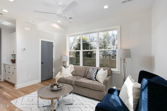 1514 W Knox St, Durham, NC 27705 - living room featuring light wood-style flooring, a ceiling fan, recessed lighting, and baseboards