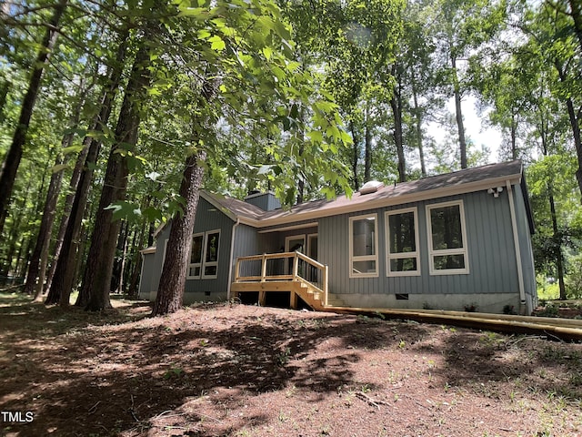 102 Pebble Ct, Chapel Hill, NC 27516 - back of house with crawl space, a wooden deck, and a shingled roof