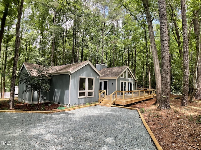 102 Pebble Ct, Chapel Hill, NC 27516 - view of front facade featuring a deck and roof with shingles