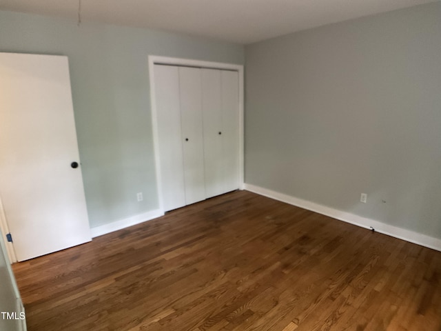 102 Pebble Ct, Chapel Hill, NC 27516 - unfurnished bedroom with a closet, wood finished floors, and baseboards