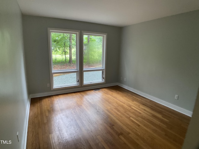 102 Pebble Ct, Chapel Hill, NC 27516 - unfurnished room featuring wood finished floors and baseboards