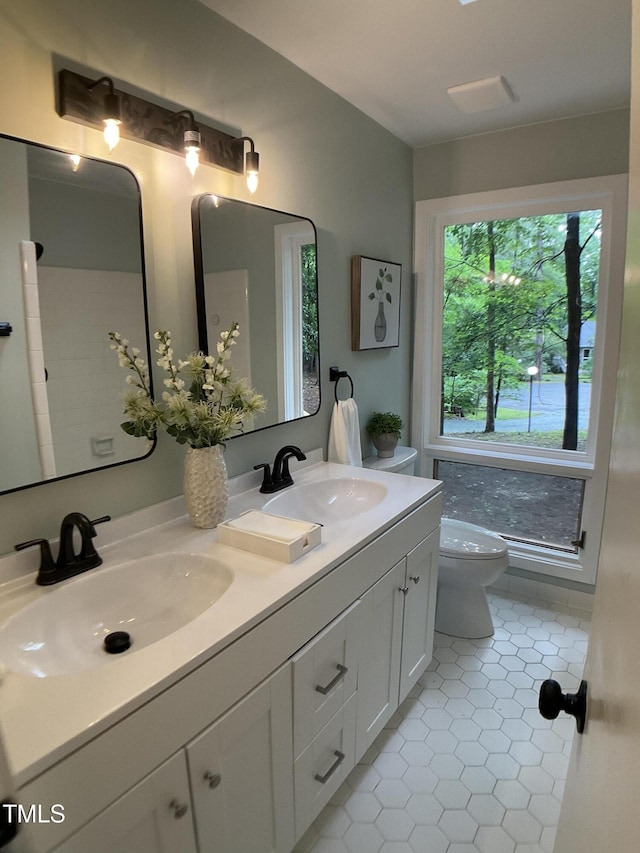 102 Pebble Ct, Chapel Hill, NC 27516 - bathroom with toilet, double vanity, and tile patterned floors