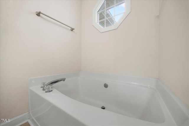 124 Roscommon Ln, Clayton, NC 27520 - bathroom with a garden tub