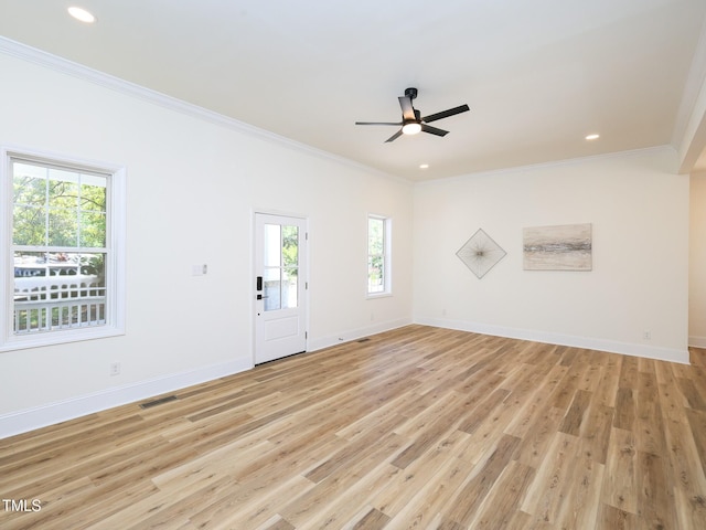 2106 University Dr, Durham, NC 27707 - unfurnished living room with crown molding, plenty of natural light, light wood-type flooring, a ceiling fan, and recessed lighting