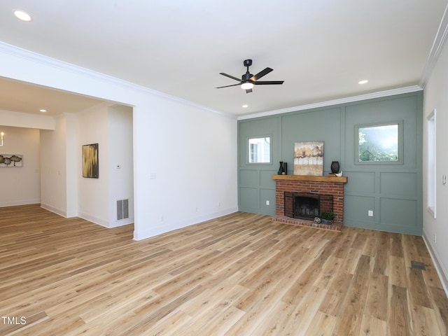 2106 University Dr, Durham, NC 27707 - unfurnished living room featuring ornamental molding, ceiling fan, light wood-style floors, baseboards, and recessed lighting