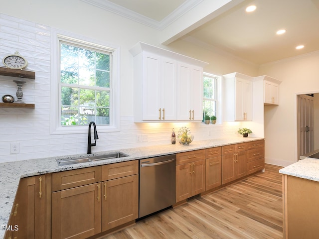 2106 University Dr, Durham, NC 27707 - kitchen with stainless steel dishwasher, a sink, backsplash, healthy amount of natural light, and ornamental molding