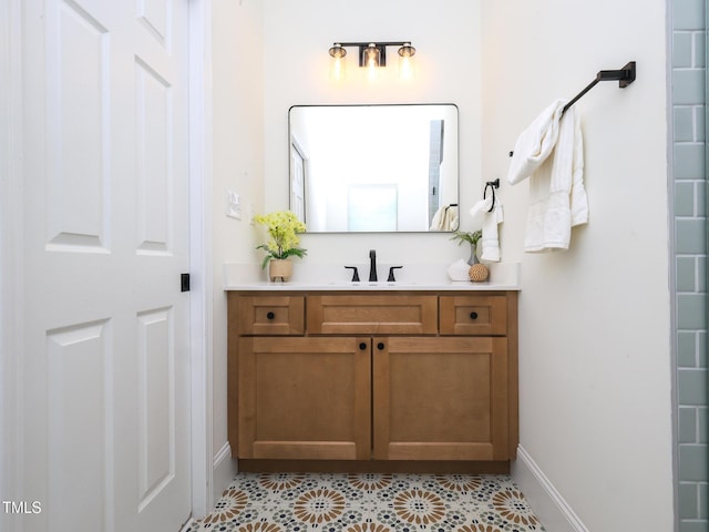 2106 University Dr, Durham, NC 27707 - bathroom with vanity, tile patterned floors, and baseboards