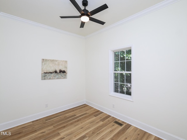 2106 University Dr, Durham, NC 27707 - unfurnished room featuring crown molding, a ceiling fan, light wood-style flooring, and baseboards