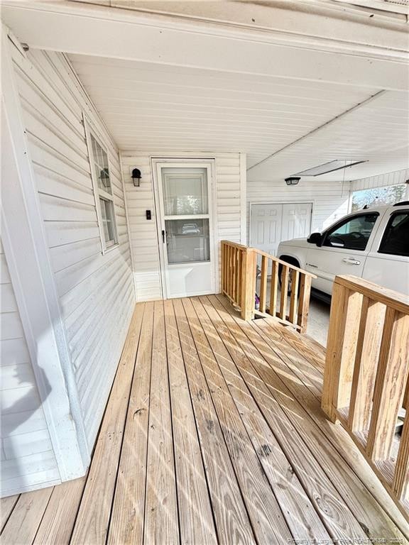 5089 Tobacco Rd, Orrum, NC 28369 - deck with a carport
