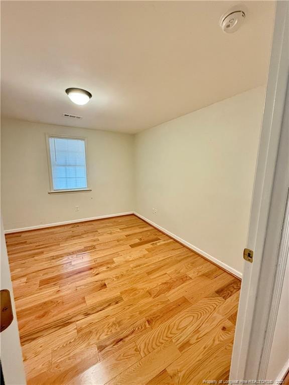 5089 Tobacco Rd, Orrum, NC 28369 - spare room featuring light wood finished floors and baseboards