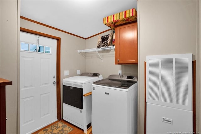 7504 Hidden Ln, Roseboro, NC 28382 - laundry room featuring cabinet space, a heating unit, separate washer and dryer, and crown molding