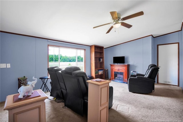 7504 Hidden Ln, Roseboro, NC 28382 - living area with crown molding, carpet floors, a ceiling fan, a glass covered fireplace, and vaulted ceiling