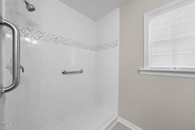 104 Archdale Dr, Durham, NC 27707 - bathroom with a tile shower and baseboards