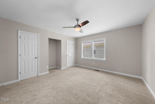 104 Archdale Dr, Durham, NC 27707 - unfurnished bedroom featuring carpet flooring, baseboards, and ceiling fan