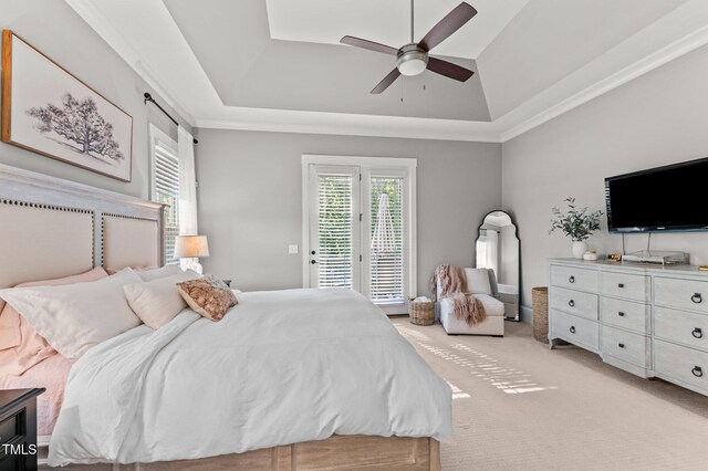 1412 Wakefield Farm Rd, Zebulon, NC 27597 - bedroom featuring a raised ceiling, access to outside, light carpet, and a ceiling fan