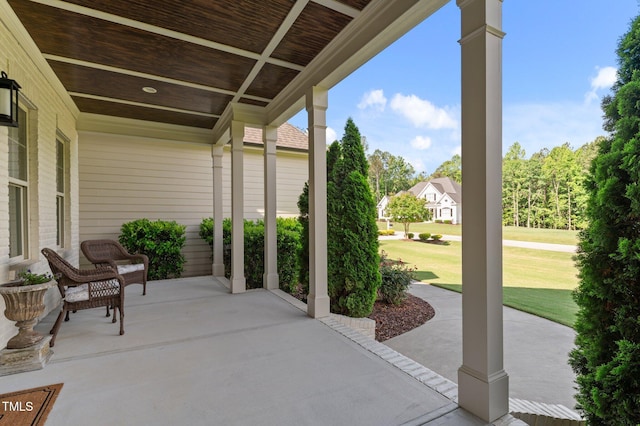 1412 Wakefield Farm Rd, Zebulon, NC 27597 - covered porch with a lawn