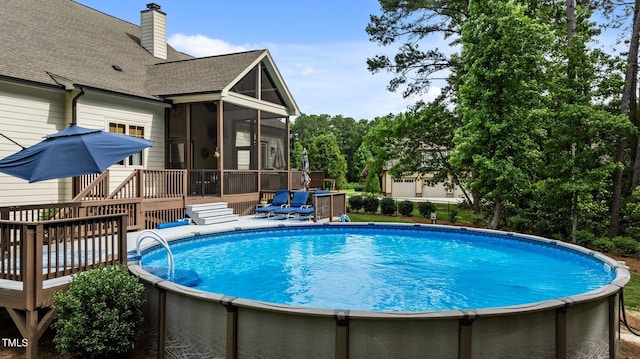 1412 Wakefield Farm Rd, Zebulon, NC 27597 - swimming pool featuring a sunroom and a wooden deck