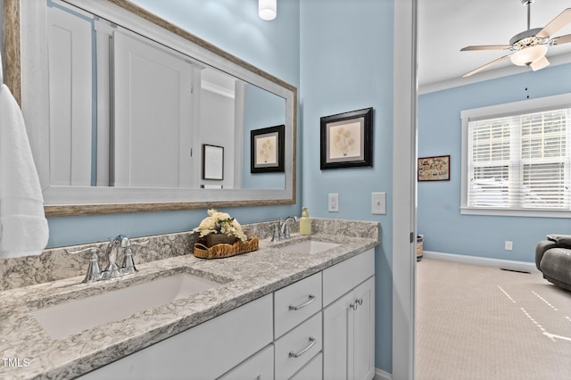 1412 Wakefield Farm Rd, Zebulon, NC 27597 - full bath with double vanity, baseboards, and ceiling fan