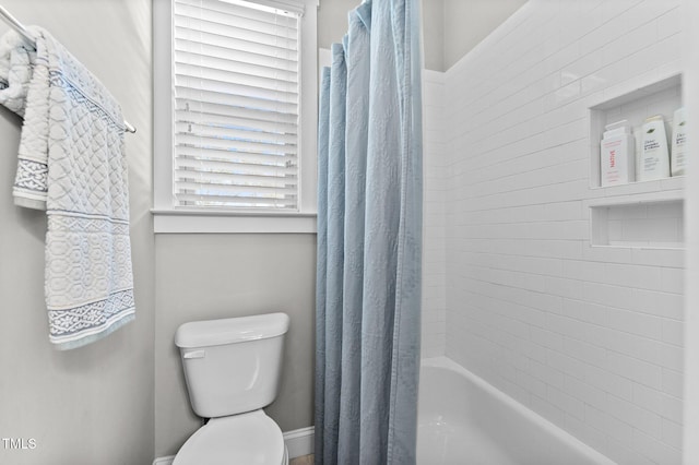 1412 Wakefield Farm Rd, Zebulon, NC 27597 - full bath with toilet, shower / bath combo with shower curtain, and baseboards