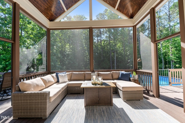 1412 Wakefield Farm Rd, Zebulon, NC 27597 - sunroom featuring vaulted ceiling and outdoor lounge area