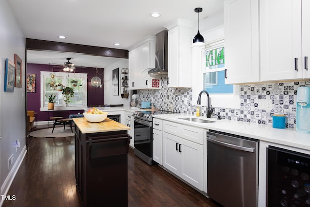 2805 Fayetteville St, Durham, NC 27707 - kitchen with appliances with stainless steel finishes, a sink, wall chimney range hood, beverage cooler, and decorative backsplash