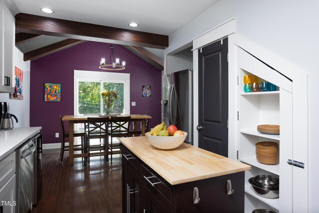 2805 Fayetteville St, Durham, NC 27707 - kitchen featuring appliances with stainless steel finishes, wood counters, dark wood-style floors, a chandelier, and baseboards
