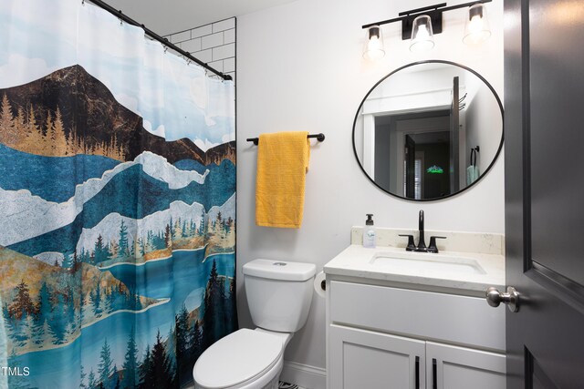 2805 Fayetteville St, Durham, NC 27707 - bathroom with vanity, toilet, and a shower with curtain