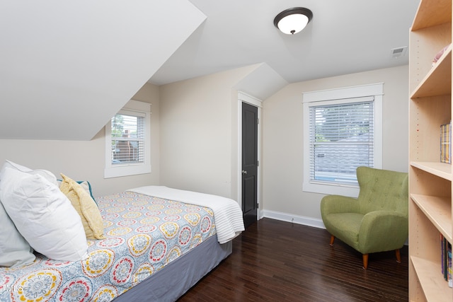 2805 Fayetteville St, Durham, NC 27707 - bedroom featuring wood finished floors, multiple windows, and baseboards