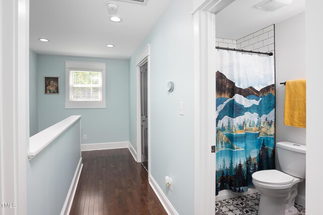 2805 Fayetteville St, Durham, NC 27707 - hall with dark wood finished floors, recessed lighting, and baseboards