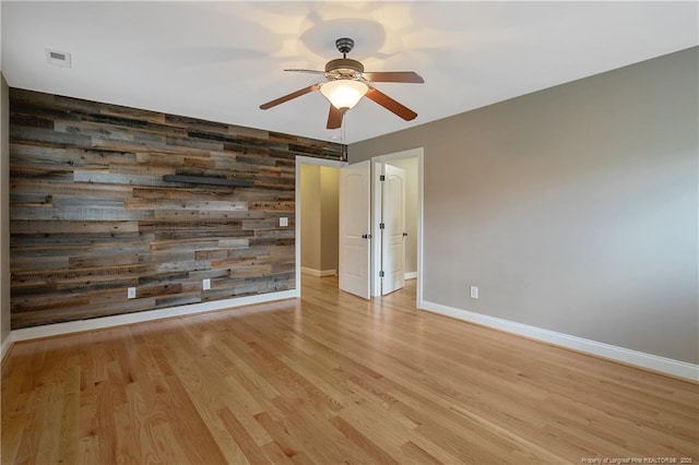 71 Orchard Falls Dr, Spring Lake, NC 28390 - empty room with baseboards, a ceiling fan, and light wood-style floors