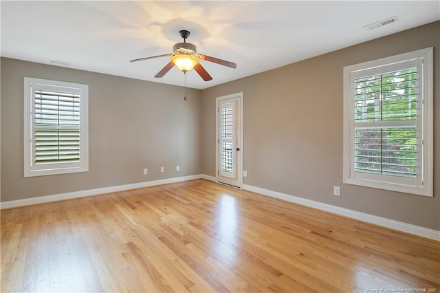 71 Orchard Falls Dr, Spring Lake, NC 28390 - spare room featuring light wood-type flooring, baseboards, and a ceiling fan