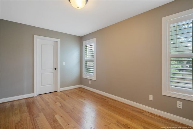 71 Orchard Falls Dr, Spring Lake, NC 28390 - empty room featuring light wood finished floors and baseboards