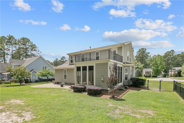 71 Orchard Falls Dr, Spring Lake, NC 28390 - rear view of house with a balcony and a patio area