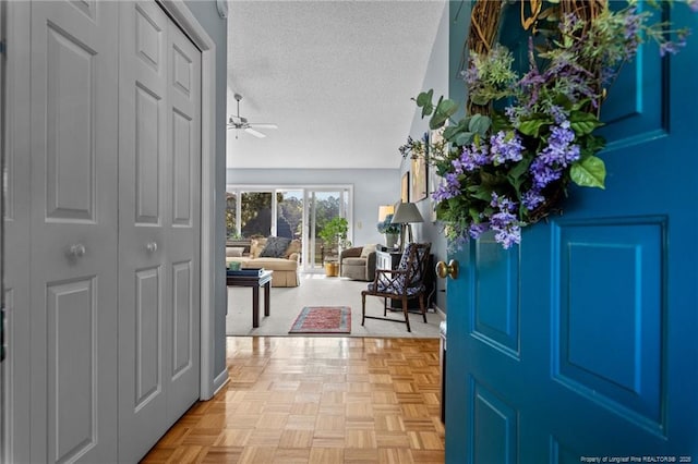 116 Fox Run Ct, West End, NC 27376 - entryway with a textured ceiling and ceiling fan