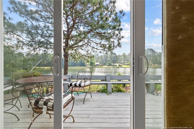 116 Fox Run Ct, West End, NC 27376 - wooden deck featuring a water view and view of wooded area