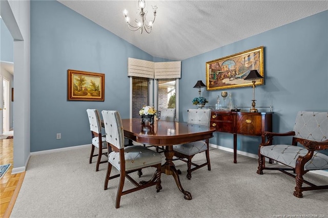 116 Fox Run Ct, West End, NC 27376 - dining space with vaulted ceiling, a chandelier, baseboards, and a textured ceiling
