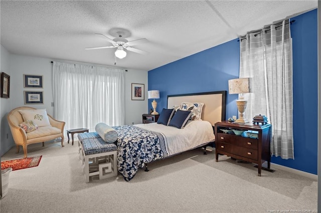 116 Fox Run Ct, West End, NC 27376 - bedroom featuring carpet, a textured ceiling, and ceiling fan