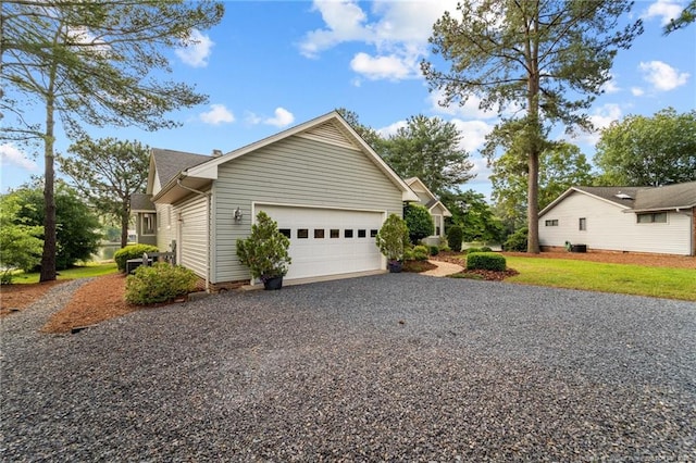 116 Fox Run Ct, West End, NC 27376 - view of home's exterior featuring gravel driveway and a garage