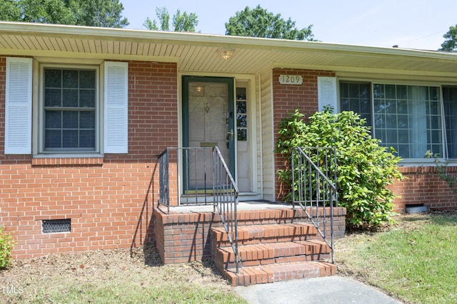 1209 Landon St, Durham, NC 27703 - entrance to property with crawl space and brick siding
