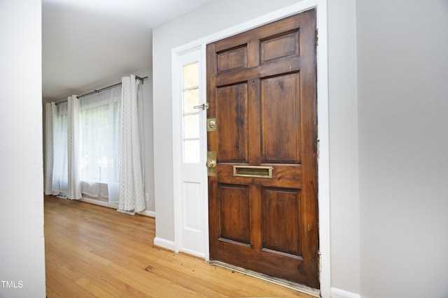 1209 Landon St, Durham, NC 27703 - entryway with light wood-style flooring and baseboards