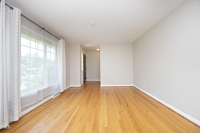 1209 Landon St, Durham, NC 27703 - unfurnished room featuring light wood-type flooring and baseboards