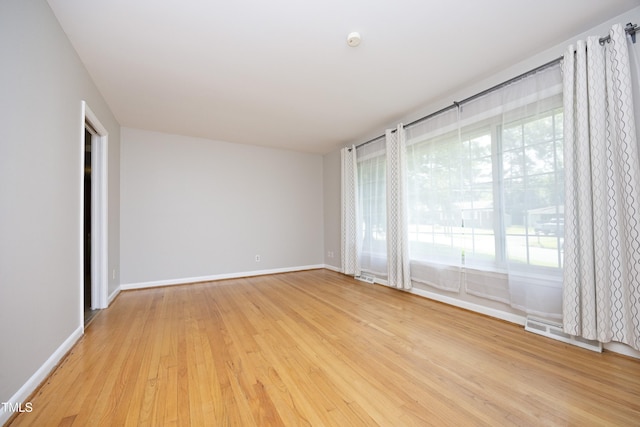1209 Landon St, Durham, NC 27703 - empty room featuring light wood-style floors and baseboards