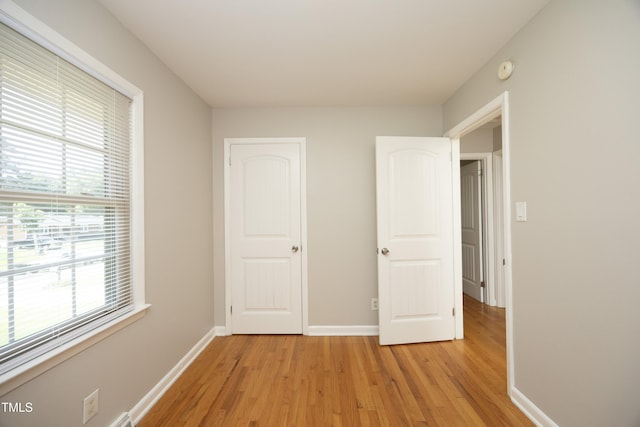 1209 Landon St, Durham, NC 27703 - unfurnished bedroom featuring light wood-style floors and baseboards