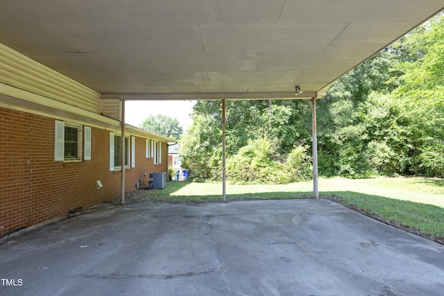 1209 Landon St, Durham, NC 27703 - view of patio featuring central air condition unit and an attached carport