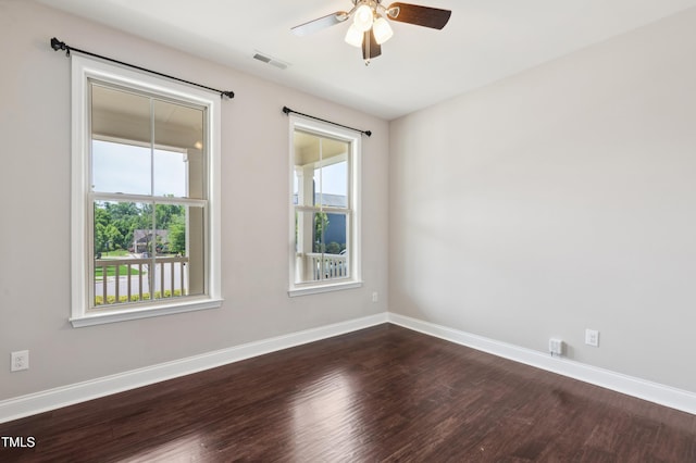 1600 Drift Falls Ln, Wendell, NC 27591 - unfurnished room with dark wood-type flooring, a ceiling fan, and baseboards