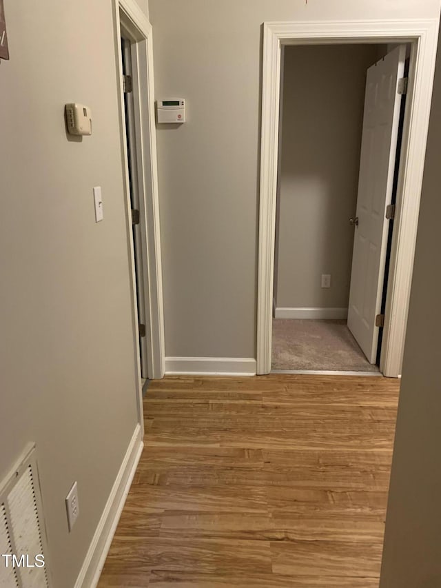 352 Riverstone Dr, Clayton, NC 27527 - hall with wood finished floors and baseboards