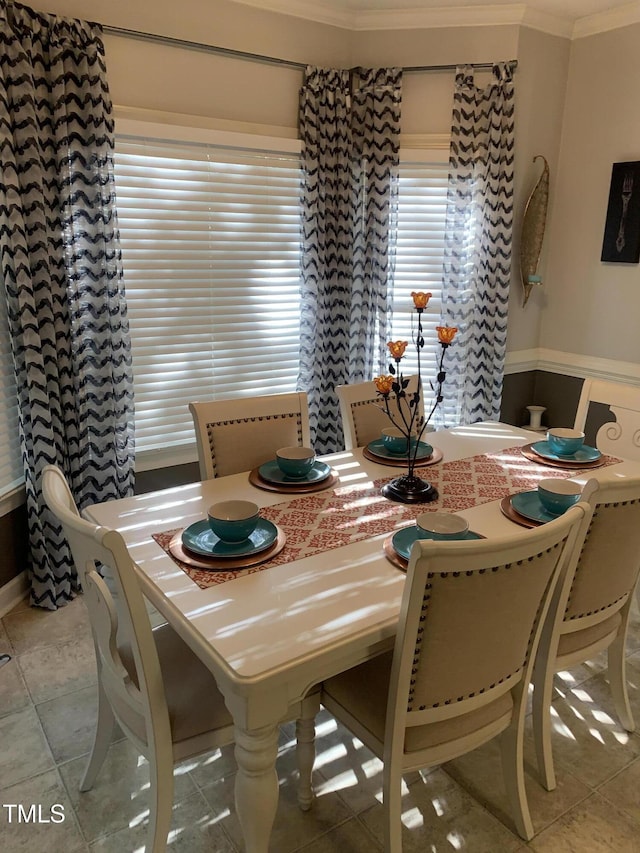 352 Riverstone Dr, Clayton, NC 27527 - dining space with ornamental molding and light tile patterned flooring