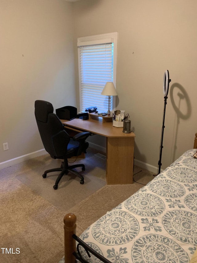 352 Riverstone Dr, Clayton, NC 27527 - carpeted bedroom with baseboards and a desk