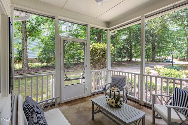 352 Riverstone Dr, Clayton, NC 27527 - sunroom / solarium featuring view of scattered trees